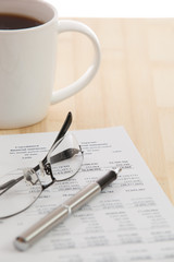 Financial report with calculator on table