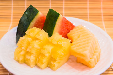 assorted fruit on white plate