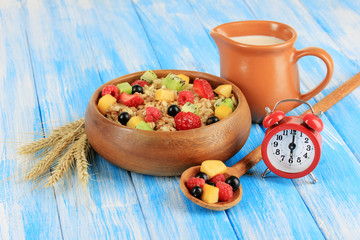 Oatmeal with fruits on table close-up