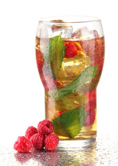 Iced tea with raspberries and mint isolated on white
