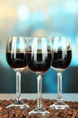 Glasses of liquor,  on bright background