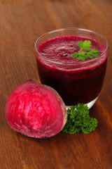 Fresh juice of beets on table close-up