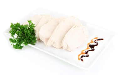 Boiled chicken meat with balsamic sauce, isolated on white