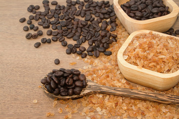  Coffee bean in the wooden spoon and rock candy sugar