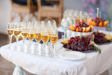 champagne glasses on wedding table, party