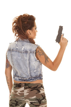 Woman Tattoos Gun Back Hold Up