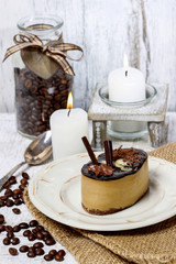 Cappuccino cake on white plate. Selective focus