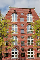 Fototapeta na wymiar Arched and Round Windows House in Amsterdam