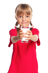 Little girl with glass of milk