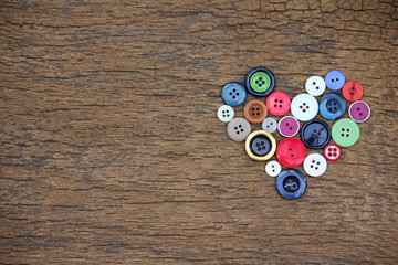 Heart of old colorful buttons