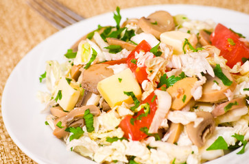 salad with chicken, mushrooms, cheese and vegetables