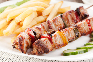 Grilled shashlik with french fries
