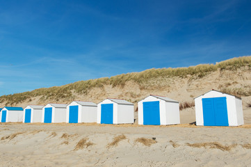 Fototapeta na wymiar Blue beach huts