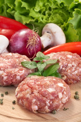 burgers with fresh vegetables, herbs and salad
