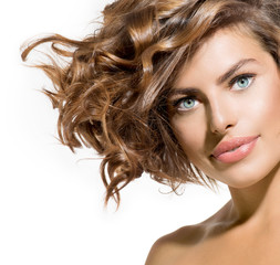 Beauty Young Woman Portrait over White. Short Curly Hair