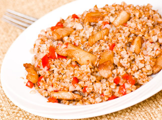 Buckwheat porridge with meat and pepper
