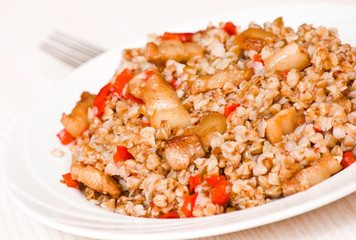Buckwheat porridge with meat and pepper
