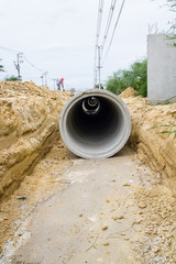 Concrete drainage tube on construction site