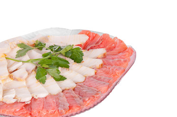 white and red fish in a plate