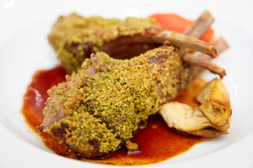 Grilled rack of lamb on plate