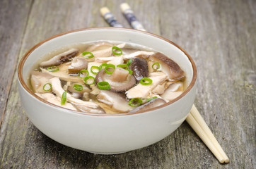 Chinese food -  bowl of soup with chicken, shiitake mushrooms