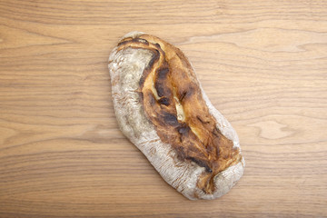 fresh sourdough bread on a table, top view