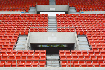Seats on main stand of public national stadium.