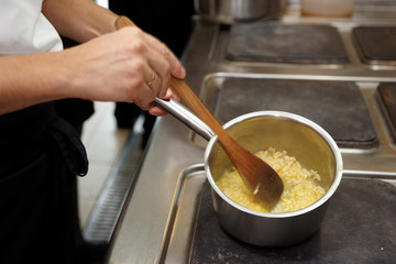 Chef is cooking risotto