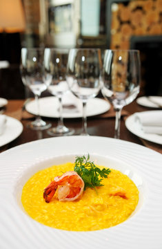 Risotto with shimp on arranged table
