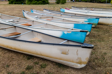 old canoes on the grass
