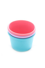 Silicone molds of different colors on a white background