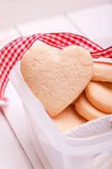 homemade heart cookies on wooden background