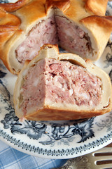 Slice of traditional style pork pie