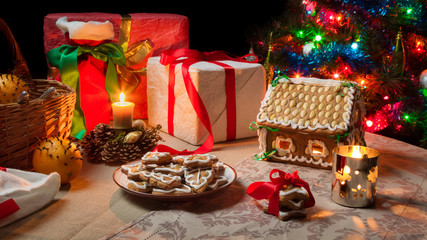 Fototapeta na wymiar Closeup of a table set with Christmas gifts
