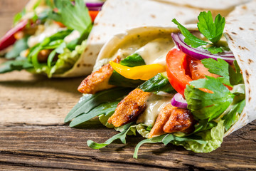 Kebab in a pancake with vegetables