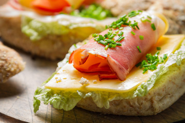Fresh sandwich with lettuce, cheese and ham