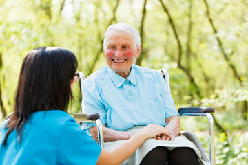 Obraz premium Smiling Lady in Wheelchair