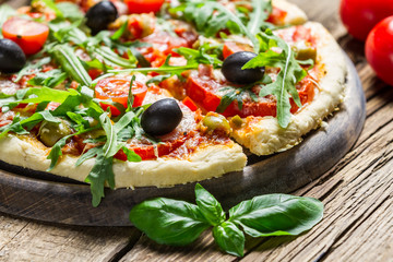 Closeup of fresh pizza with vegetables