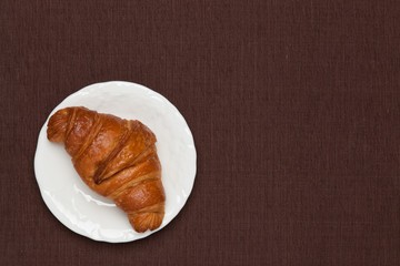 croissant on the table cloth
