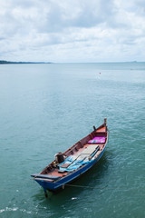 Fototapeta na wymiar Fishing boats moored at sea.