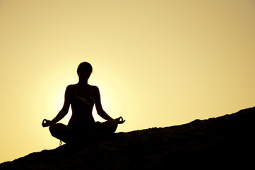 Seaside yoga poses at sunrise