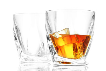 Glasses of whiskey, isolated on white