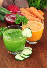 Fresh vegetable juices on table close-up