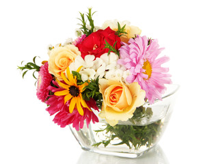 Beautiful bouquet of bright flowers in glass vase, isolated