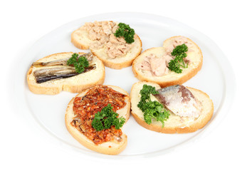 Tasty sandwiches with tuna and cod liver sardines different