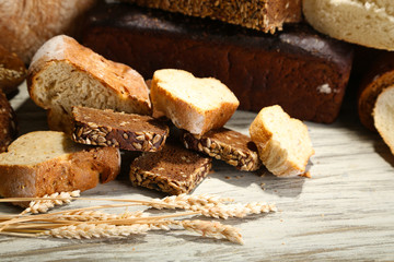 Much bread on wooden board