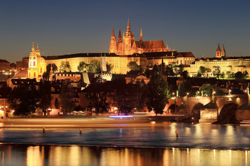 Fototapeta na wymiar Colorful Prague gothic Castle with Charles Bridge in the Night