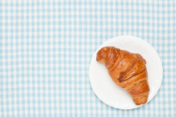 croissant on the table cloth