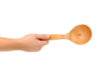 Hand Holds Wooden Spoon