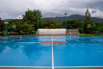 wet basketball court in a university